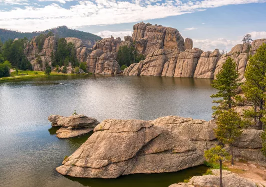 Rock formation and lagoon with trees