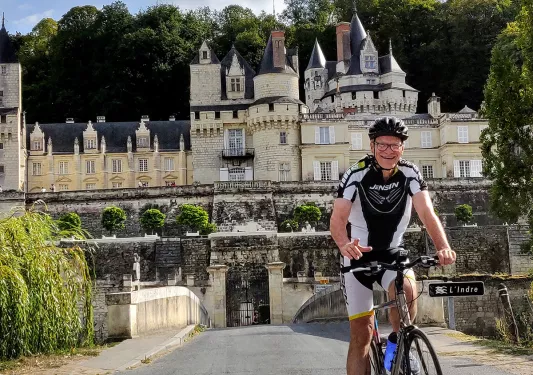 Guest Biking in Front of Castle