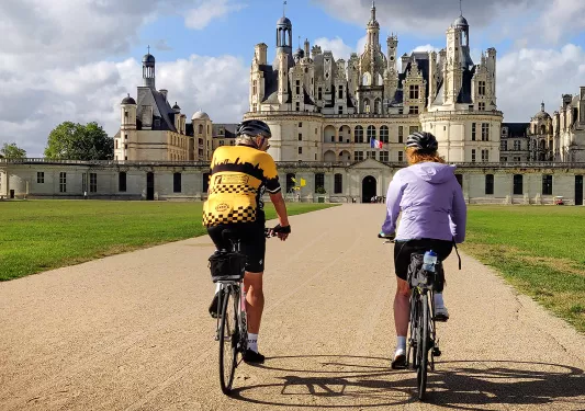 Two Backroads Guests Biking to Castle