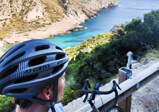 Biker taking selfie along the coast in Mallorca.