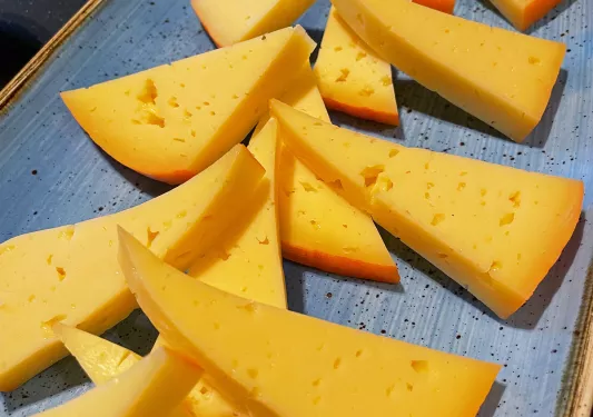 Arrangement of slices of cheese.