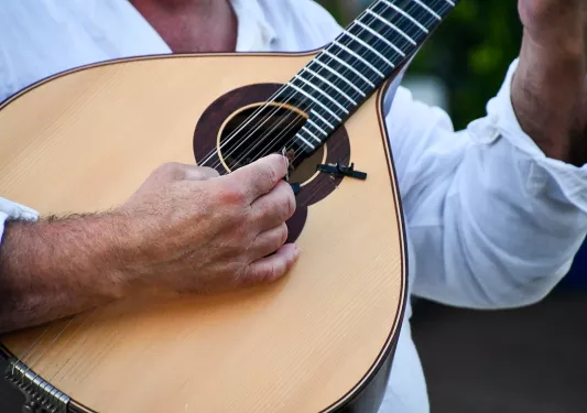 Local playing string instrument. 