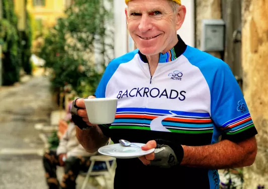 Backroads Guest Drinking Coffee 