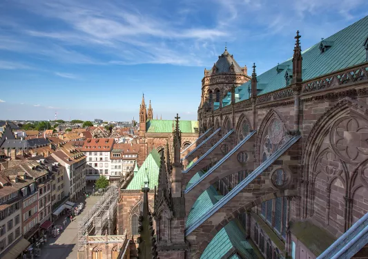 Landscape shot of the side of a cathedral + town