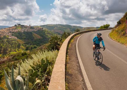 Backroads guest biking on path