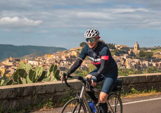 Backroads guest biking on path