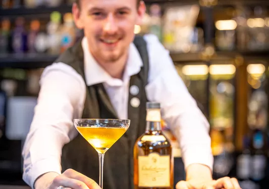 Bartender sliding camera cocktail.