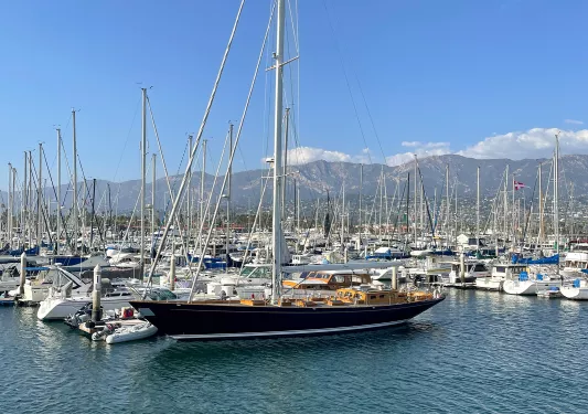 Wide shot of ship fleet on water.