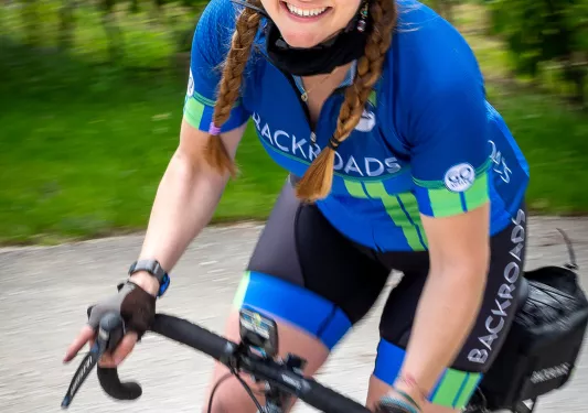 Action shot of leader on bike.