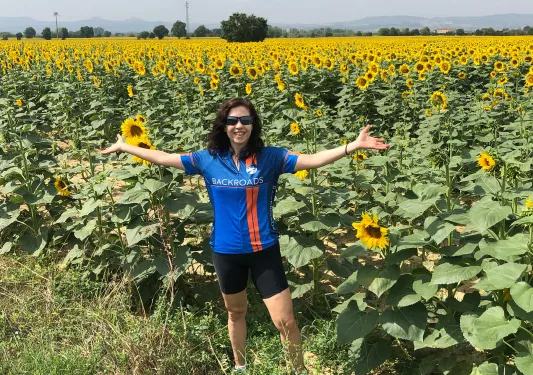 Guest among sunflower field.