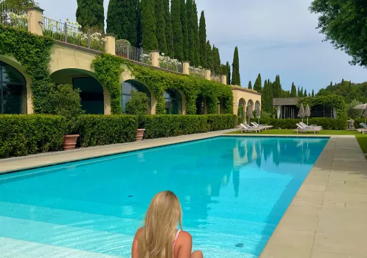 Guest relaxing poolside.