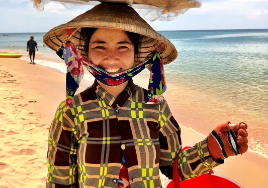 Local Vietnamese woman on the beach