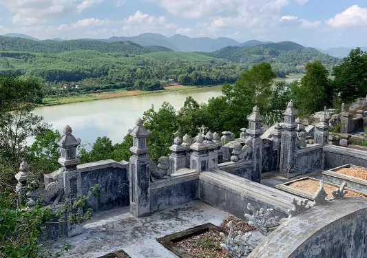 Shot of the Mausoleum of Emperor Khai Dinh, looking towards river.