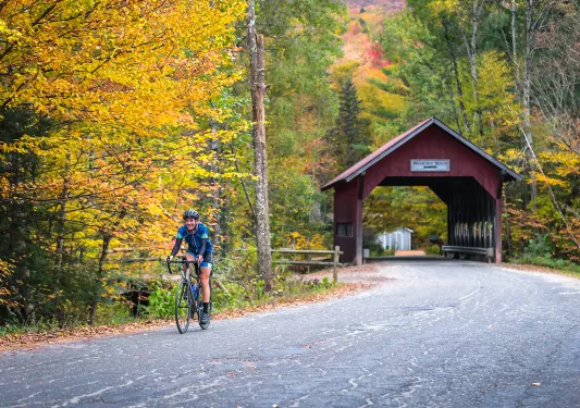 Guest cycling out from bike bridge.