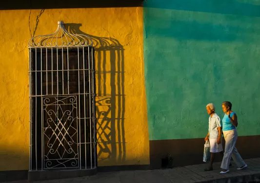 Locals Walking Sunset City Cuba