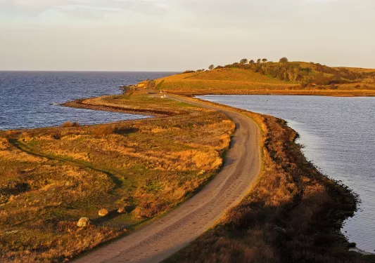 Coastal bike path at sunset