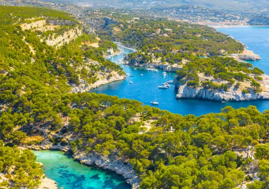 Crystal clear bodies of water with island masses of land.