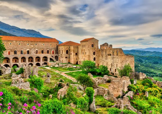 Wide shot of the Castle of Mystras and it's surrounding jungle.
