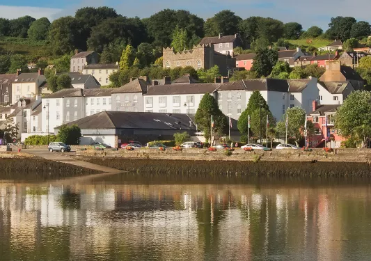 Exterior view of the Actons Hotel from across the water.