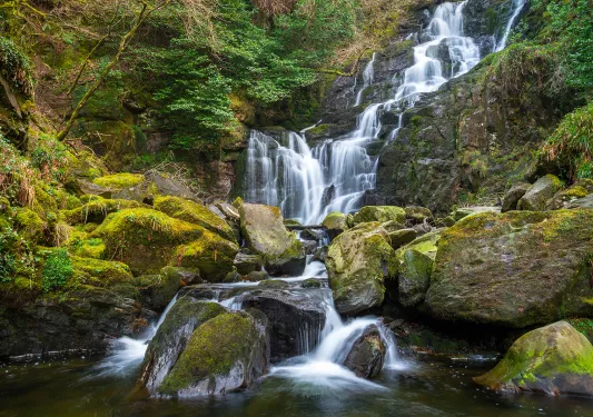 waterfall over mossy rocks