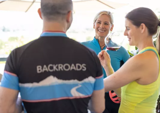 Three guests at wine tasting.