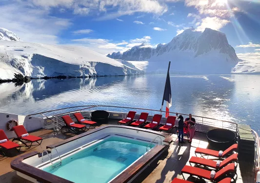 Cruise ship pool overlooking ice bergs in Antarctica