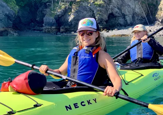 Guests in green kayak