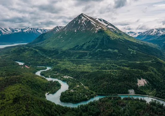 Wide shot of the Kenai River and it's surrounding mountain landscape.