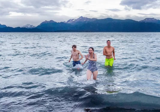 Guests running in water