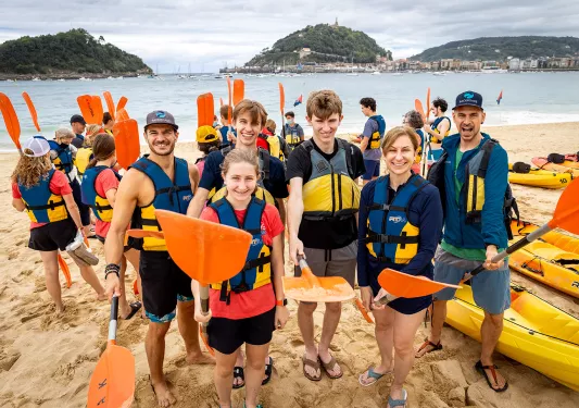 Group of guests getting ready to kayak.