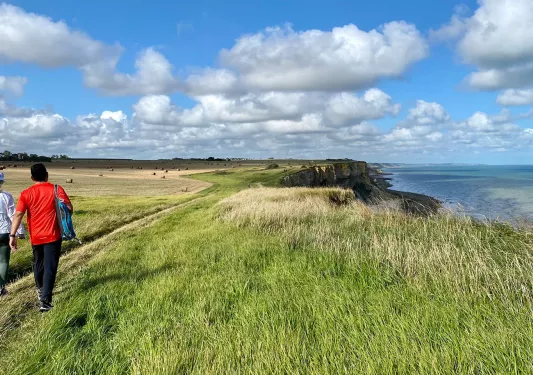 Backroads Guests Walking with Water View