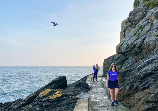 Backroads Guests Walking Path Between Rocks