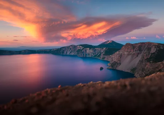 Wide shot of Crater Lake during sunset.