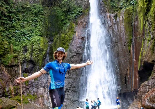Leader Showcasing Large Waterfall Costa Rica