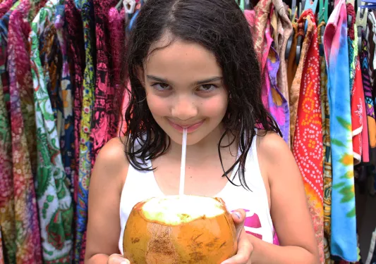 Guest Drinking From Coconut