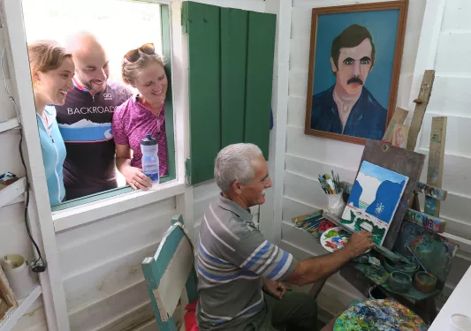 Guests Observing Cuban Arist