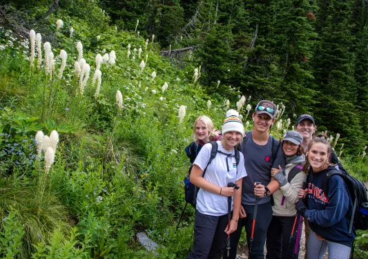 Backroads family smiling while hiking 