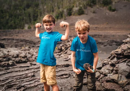 Two kids posing while hiking in Hawaii