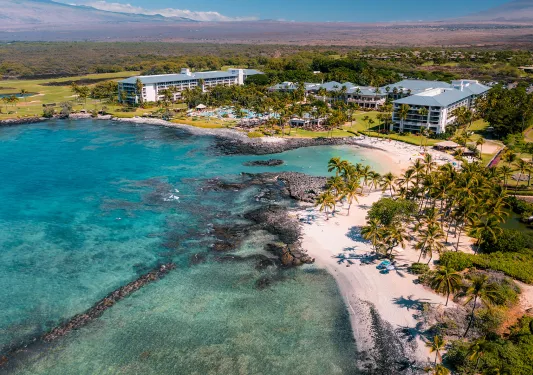 Aerial view of a white sand beach in Hawaii