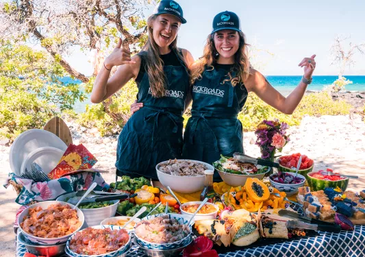 Two Backroads leaders with a picnic at the beach in Hawaii