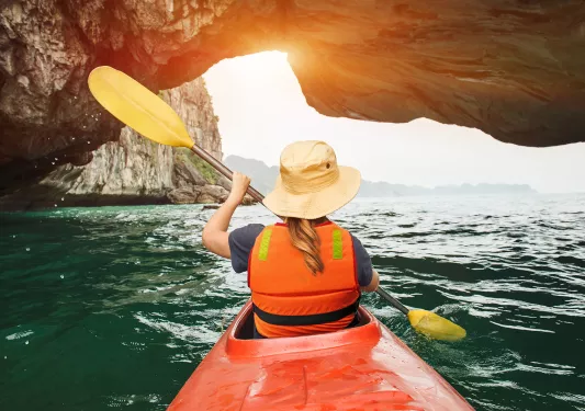 Kayaking among stone arches and cliffs in Vietnam
