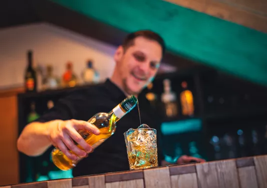 Bartender Pouring Drink