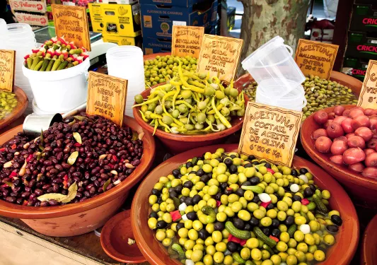 Arrangements of pickled veggies, olives, etc.