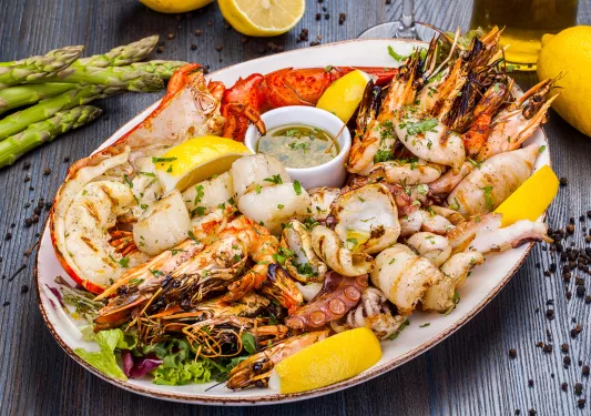 Seafood platter with shrimp, lobster, scallop, squid and octopus.