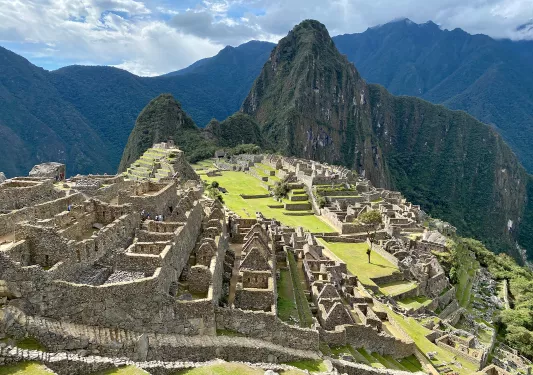 Wide shot of Machu Picchu ruins.