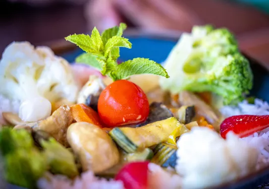 Fresh colorful salad with broccoli, tomatoes and other vegetables