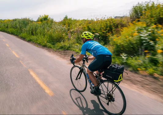 Guest quickly riding down road.