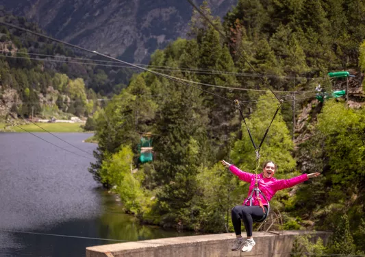 Young woman zip-lining 
