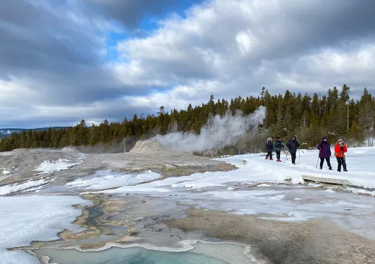 Hot springs and snow with crystal clear blue water