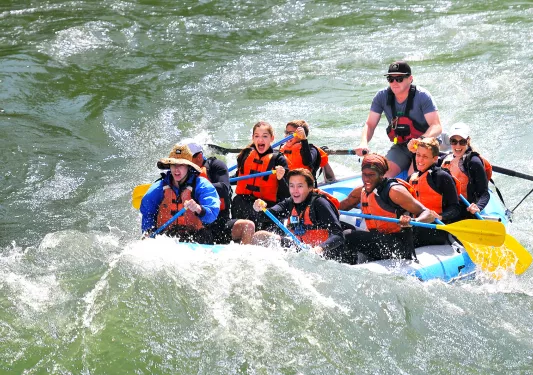 Backroads guests white water rafting 